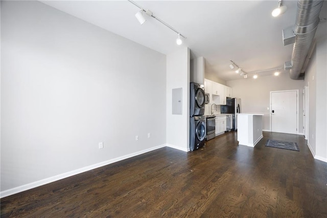 5300 Peachtree Rd Unit 3207, Chamblee, GA 30341 - unfurnished living room featuring track lighting, dark wood-type flooring, and electric panel