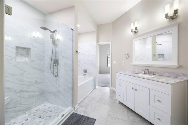 5300 Peachtree Rd Unit 3207, Chamblee, GA 30341 - full bathroom featuring a bath, a stall shower, and vanity