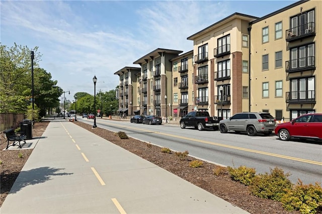 5300 Peachtree Rd Unit 3207, Chamblee, GA 30341 - view of asphalt road with street lights and sidewalks