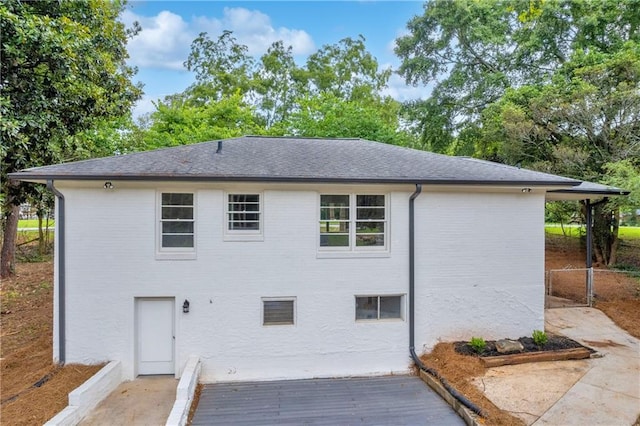 back of house with a patio