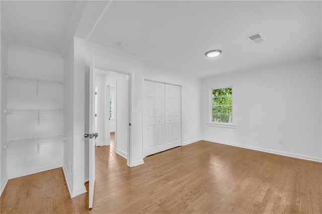 unfurnished bedroom featuring hardwood / wood-style floors