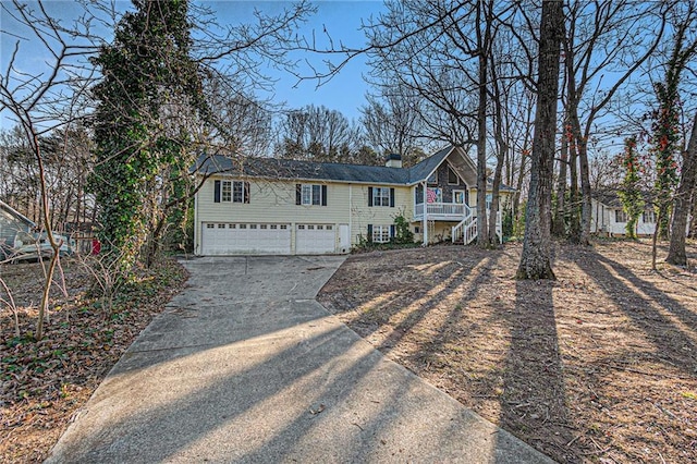 raised ranch featuring a garage