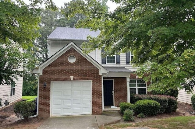 view of front of property with a garage