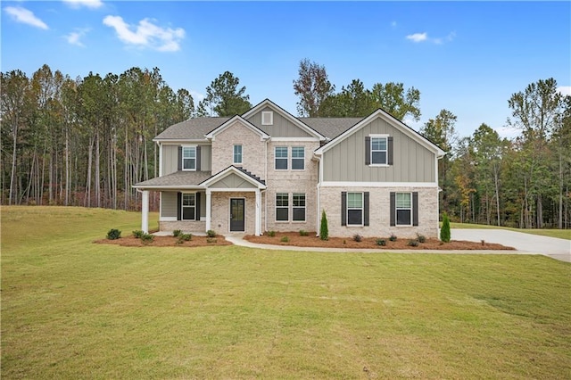 craftsman-style home featuring a front yard