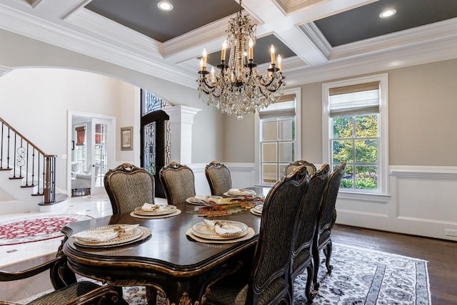 dining area featuring coffered ceiling, french doors, dark hardwood / wood-style flooring, and crown molding