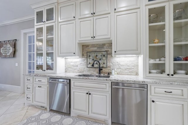 kitchen with decorative backsplash, sink, crown molding, light tile patterned floors, and dishwasher