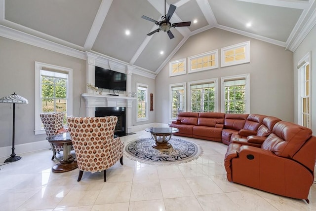 tiled living room featuring plenty of natural light, ornamental molding, and ceiling fan