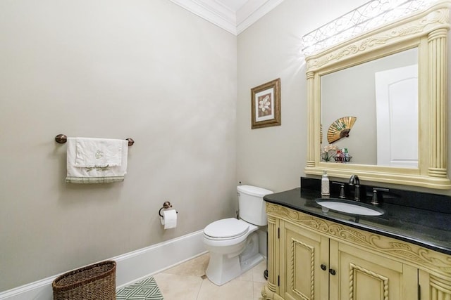 bathroom with crown molding, toilet, tile patterned flooring, and vanity