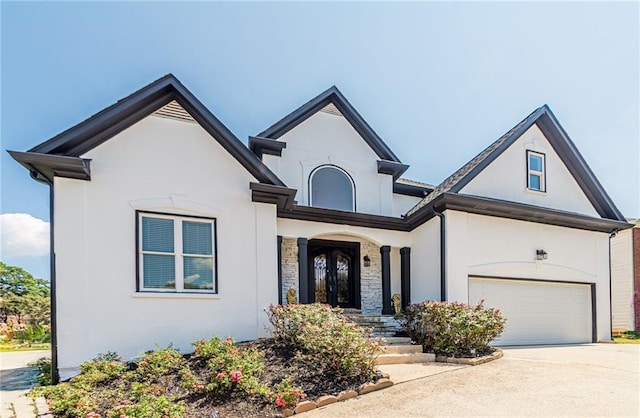 view of front of property with a garage