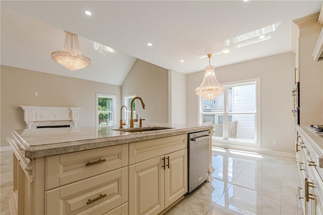 kitchen with dishwasher, a center island with sink, sink, hanging light fixtures, and a chandelier