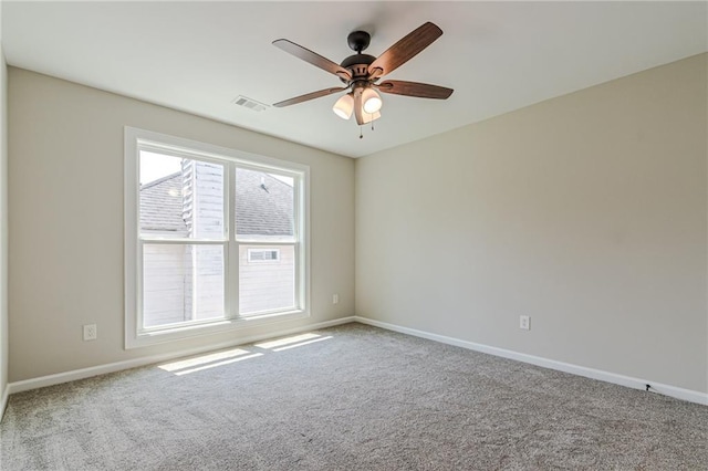 carpeted empty room with ceiling fan