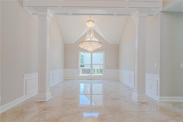 empty room featuring decorative columns