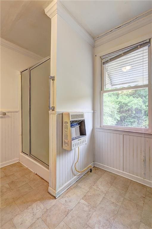 6191 Cumming Hwy, Canton, GA 30115 - unfurnished room with wainscoting, ornamental molding, light stone finish floors, and heating unit