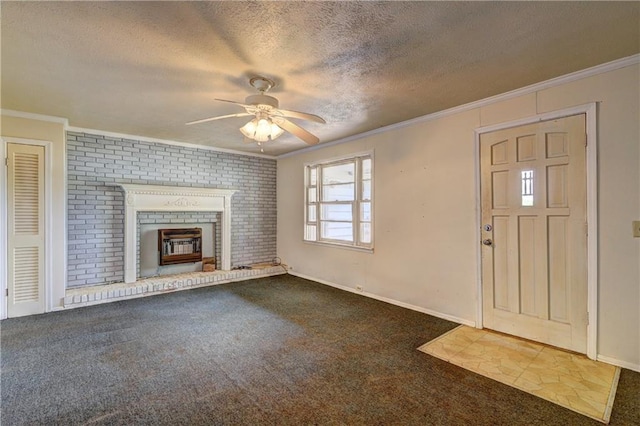 6191 Cumming Hwy, Canton, GA 30115 - unfurnished living room with carpet flooring, ceiling fan, a textured ceiling, ornamental molding, and a fireplace