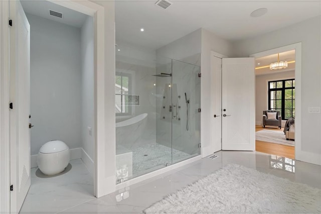 bathroom featuring visible vents, marble finish floor, and baseboards