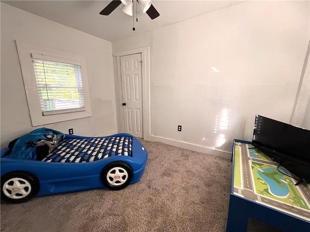 bedroom featuring carpet and ceiling fan