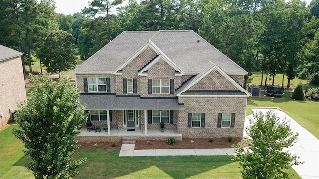 craftsman-style home with a front lawn