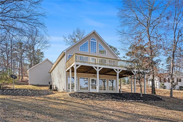 view of front facade with a wooden deck