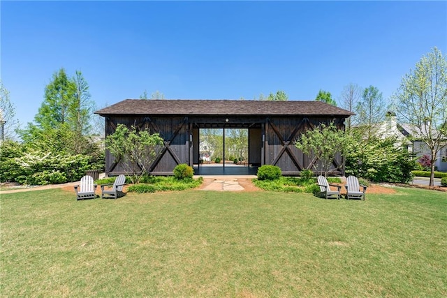 7165 Cordery Rd, Cumming, GA 30040 - back of property with a lawn and an outdoor structure