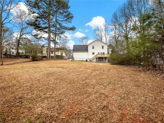 view of yard featuring a wooden deck