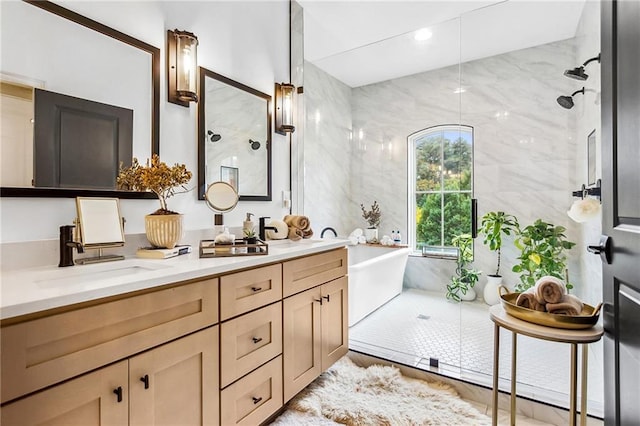 bathroom with plus walk in shower and vanity