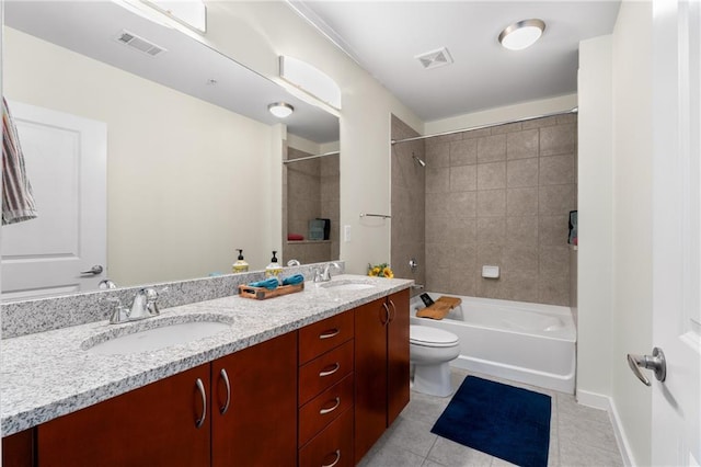 full bathroom featuring tile patterned flooring, a sink, and visible vents