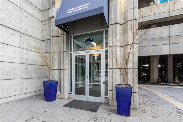 property entrance featuring french doors