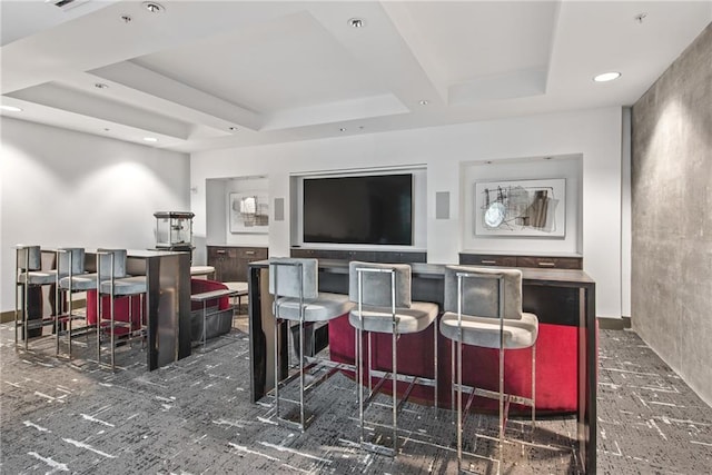 bar with recessed lighting and a raised ceiling