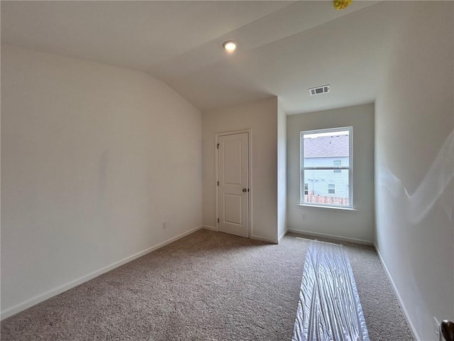 1956 Asher Ln Unit 51, Conyers, GA 30013 - unfurnished bedroom with carpet floors, baseboards, and lofted ceiling