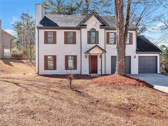 view of front of property with a garage