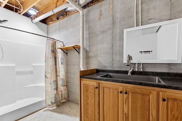 bathroom with vanity and concrete floors