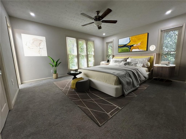 carpeted bedroom featuring a textured ceiling, ceiling fan, baseboards, and recessed lighting