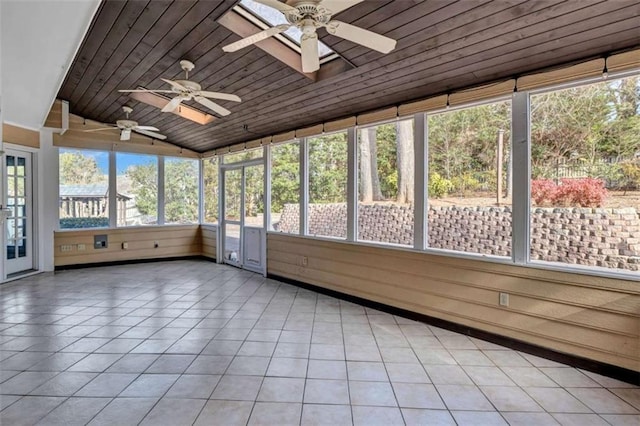 unfurnished sunroom featuring ceiling fan, lofted ceiling, and wood ceiling