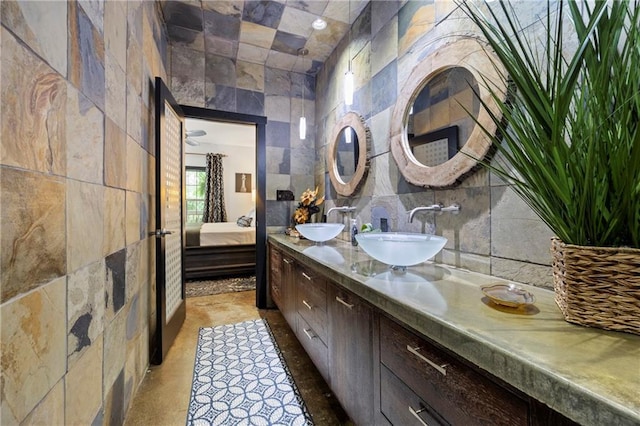 bathroom featuring toilet, vanity, and curtained shower