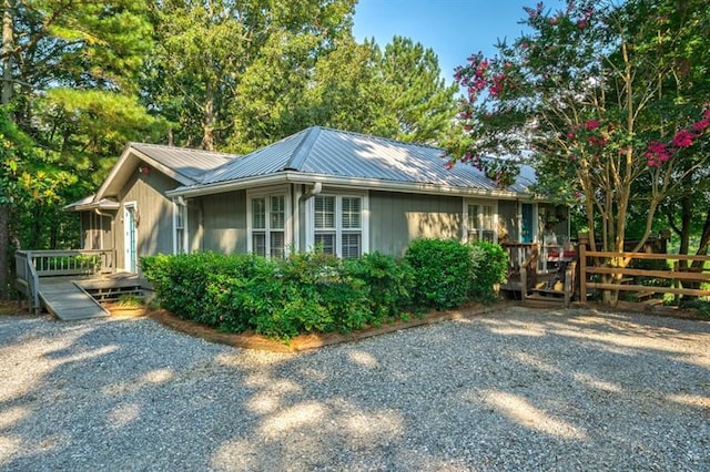 view of home's exterior featuring a deck