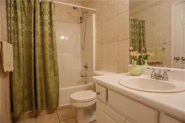 full bathroom featuring tile walls, tile patterned flooring, vanity, toilet, and shower / bath combo with shower curtain