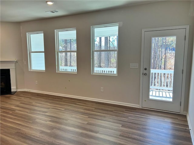 doorway to outside with dark hardwood / wood-style floors