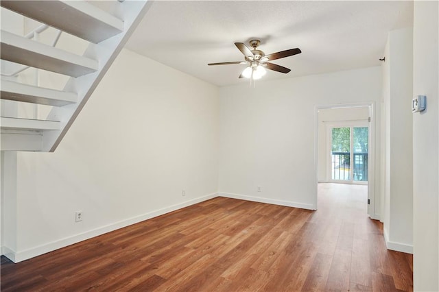 587 Virginia Ave NE Unit 315, Atlanta, GA 30306 - empty room featuring baseboards, wood finished floors, and a ceiling fan