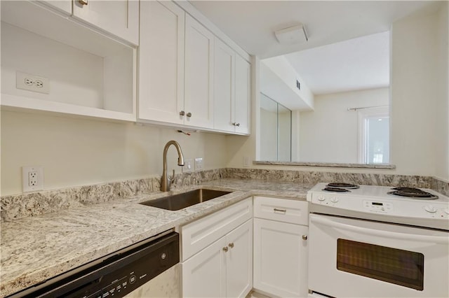 587 Virginia Ave NE Unit 315, Atlanta, GA 30306 - kitchen with light stone countertops, a sink, white cabinets, dishwasher, and white electric range