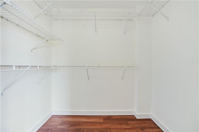 587 Virginia Ave NE Unit 315, Atlanta, GA 30306 - walk in closet featuring wood finished floors