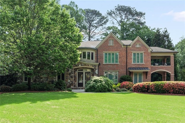 4835 Merlendale Ct, Atlanta, GA 30327 - view of front of house with a front lawn and brick siding