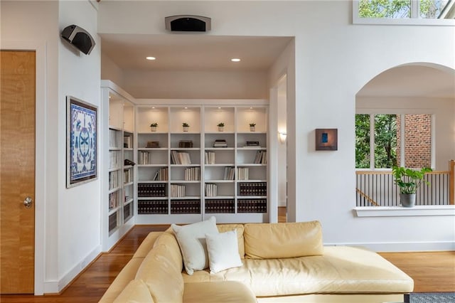 4835 Merlendale Ct, Atlanta, GA 30327 - sitting room featuring baseboards, wood finished floors, arched walkways, and recessed lighting