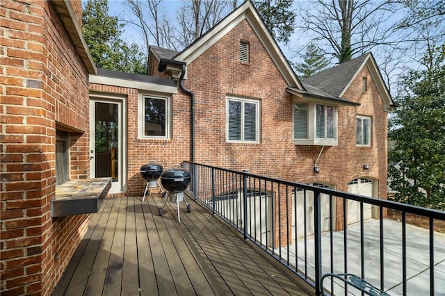 4835 Merlendale Ct, Atlanta, GA 30327 - wooden terrace with an attached garage