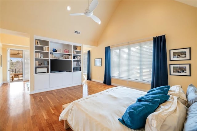 4835 Merlendale Ct, Atlanta, GA 30327 - bedroom with visible vents, baseboards, wood finished floors, and high vaulted ceiling