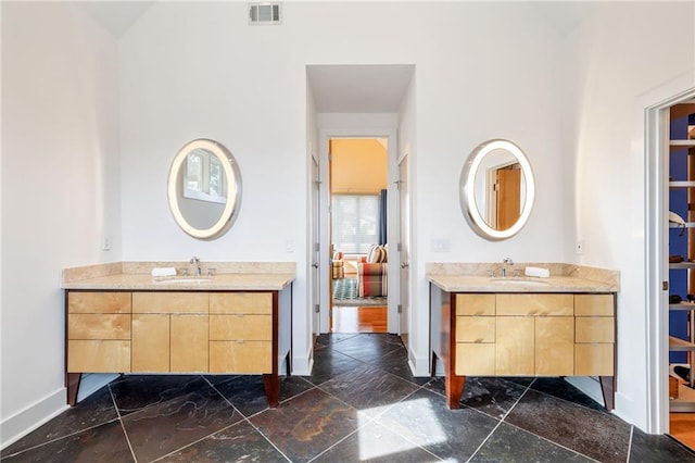4835 Merlendale Ct, Atlanta, GA 30327 - full bathroom with two vanities, visible vents, and a sink