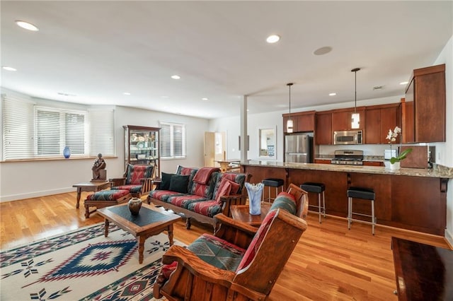 4835 Merlendale Ct, Atlanta, GA 30327 - living room featuring recessed lighting, light wood-style floors, and baseboards