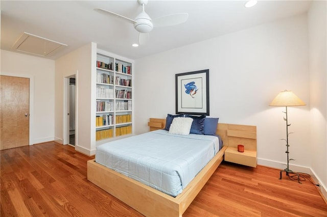 4835 Merlendale Ct, Atlanta, GA 30327 - bedroom with attic access, wood finished floors, baseboards, and recessed lighting