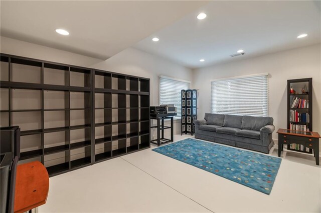 4835 Merlendale Ct, Atlanta, GA 30327 - living area with recessed lighting, visible vents, and finished concrete flooring