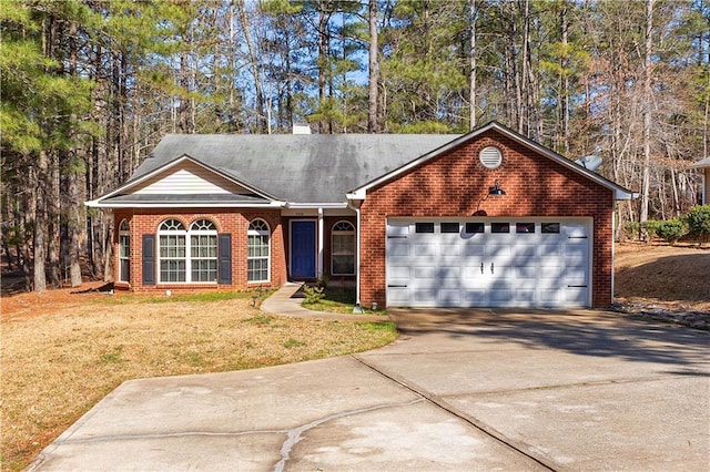 ranch-style house with brick siding, concrete driveway, a front yard, a chimney, and an attached garage