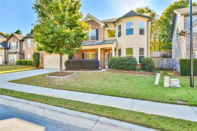 view of front of home with a front lawn and a garage